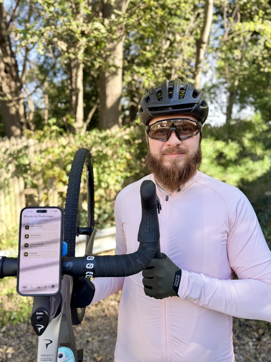 Pavel Lev, creator of Emozle, with his bicycle outdoors
